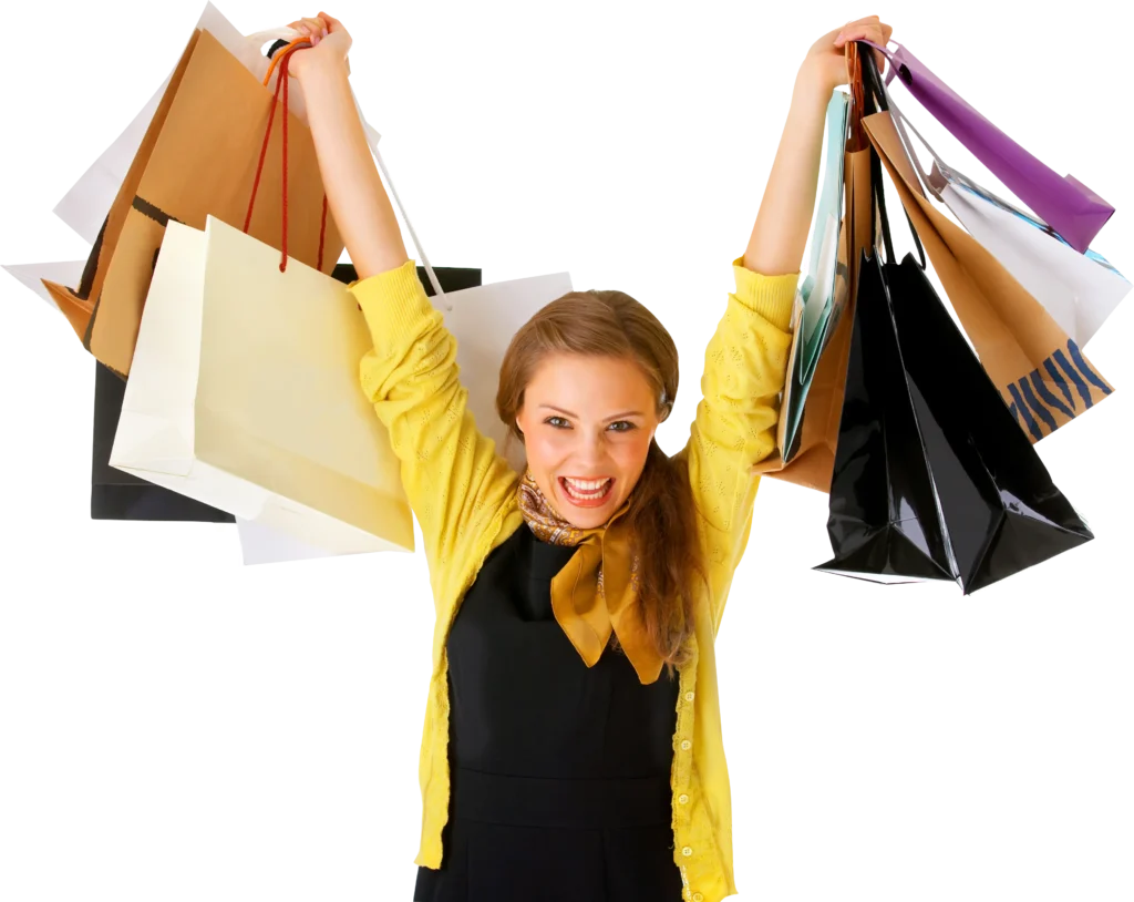 chica con bolsas de compra en roca village barcelona llevada por easy taxi barcelona